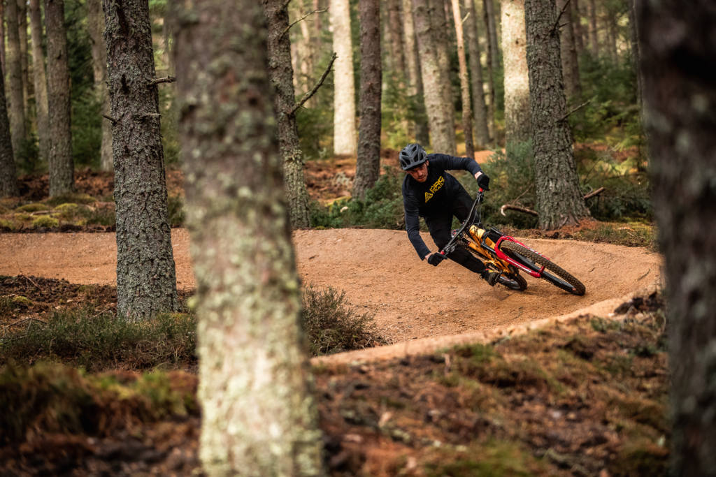 A member of the CRC team test riding the Glenlivet Estate mountain bike trail