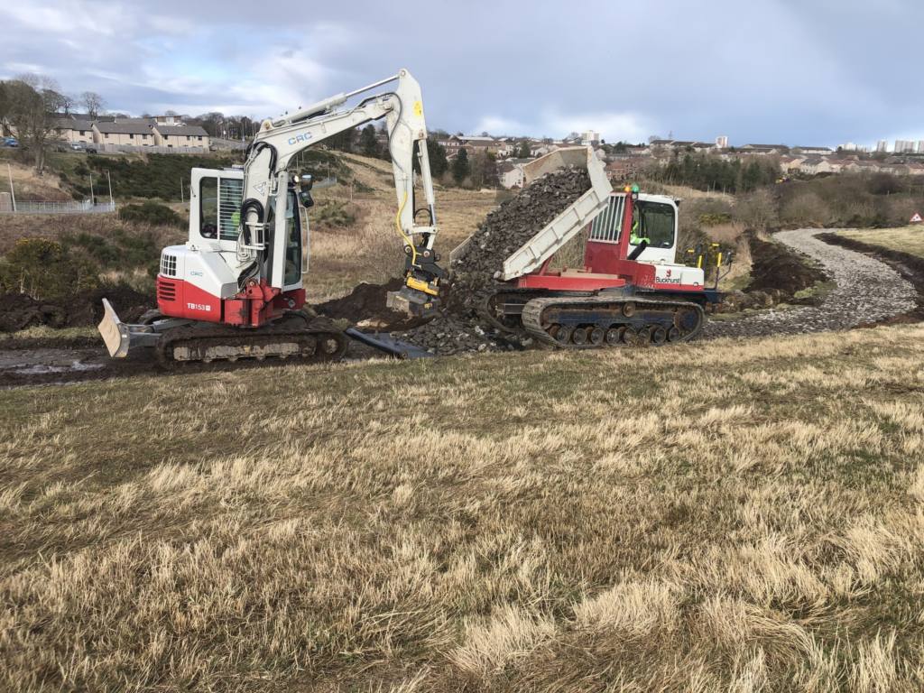 An excavator and dumper completing work at Den of Maidencraig Nature Reserve